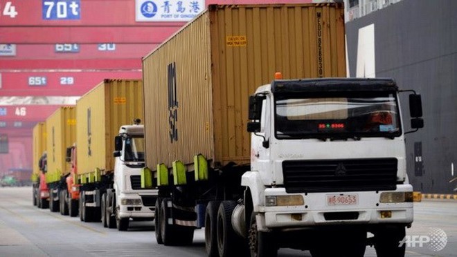 WTO dự đoán lưu lượng các container tới các cảng lớn trên thế giới sẽ tăng. Nguồn: AFP