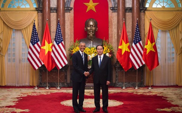 Chủ tịch nước Trần Đại Quang và Tổng thống Barack Obama - Ảnh: Reuters.