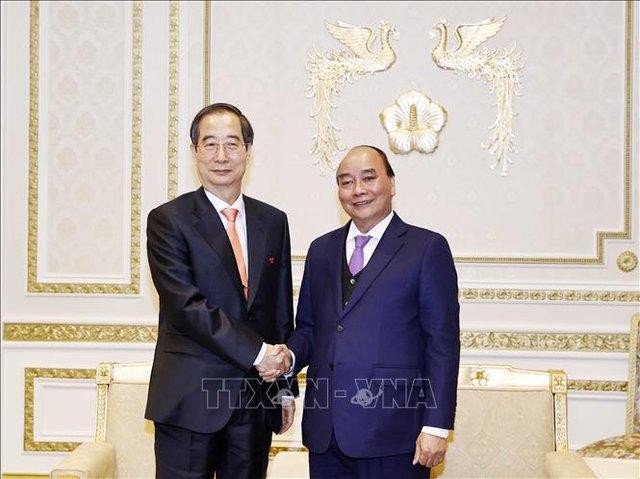 Chủ tịch nước Nguyễn Xuân Phúc hội kiến Thủ tướng Hàn Quốc Han Duck Soo