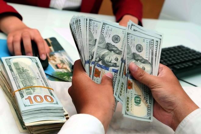 Tỷ giá chịu tác động sức nóng tăng giá trên thế giới