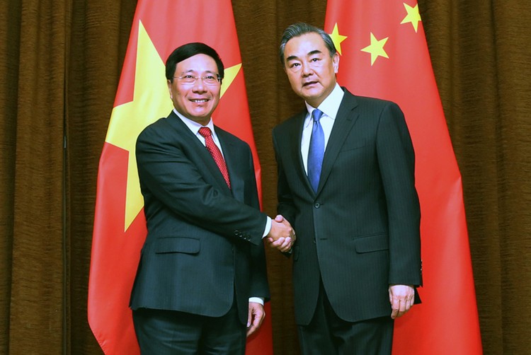 Phó Thủ tướng, Bộ trưởng Ngoại giao Phạm Bình Minh và Bộ trưởng Ngoại giao Trung Quốc Vương Nghị. Ảnh: VGP