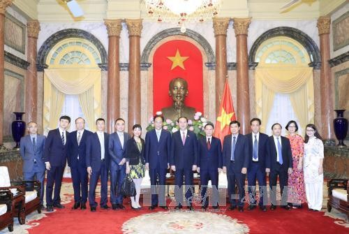 Chủ tịch nước Trần Đại Quang tiếp đoàn đại biểu Hãng thông tấn Tân Hoa xã đang ở thăm và làm việc tại Việt Nam. Ảnh: TTXVN