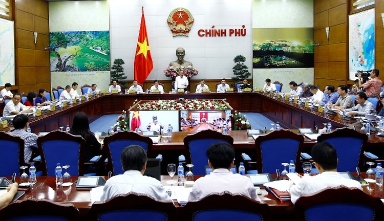 Phó Thủ tướng Thường trực Trương Hoà Bình chủ trì cuộc họp trực tuyến toàn quốc sơ kết công tác CCHC) 6 tháng đầu năm 2017 và công bố Chỉ số PAR INDEX 2016. Ảnh: VGP