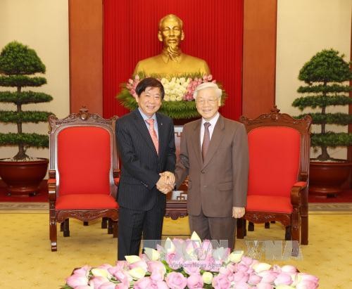 Tổng Bí thư Nguyễn Phú Trọng tiếp Chủ tịch Đảng Hành động Nhân dân Singapore (PAP). Ảnh: TTXVN