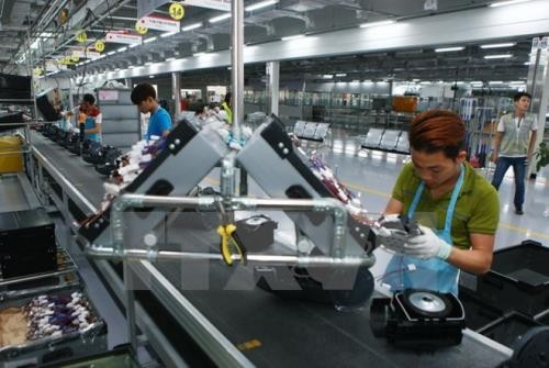 Dây chuyền sản xuất thiết bị điện tử gia dụng tại công ty LG Electronics Việt Nam. Ảnh: TTXVN