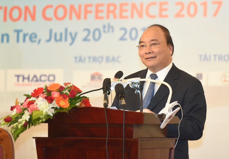 Thủ tướng Nguyễn Xuân Phúc phát biểu tại  Hội nghị xúc tiến đầu tư tỉnh Bến Tre. Ảnh: VGP