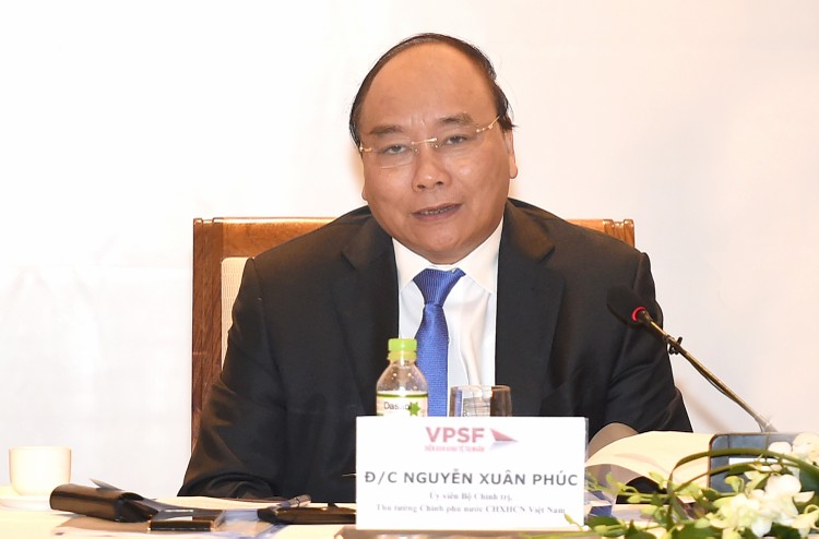 Thủ tướng Chính phủ Nguyễn Xuân Phúc phát biểu tại Diễn đàn Kinh tế tư nhân Việt Nam sáng 31/7. Ảnh: VGP