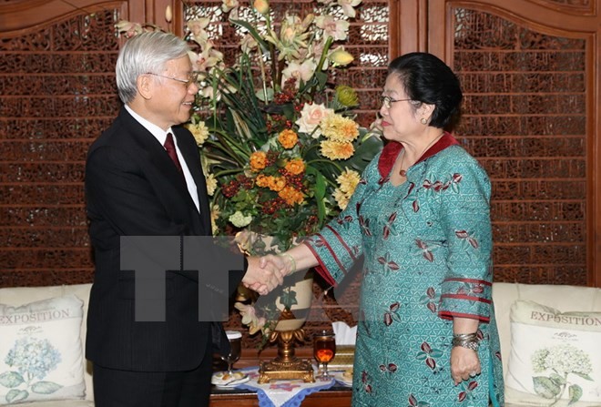 Tổng Bí thư Nguyễn Phú Trọng hội kiến với Chủ tịch Đảng Dân chủ đấu tranh (PDI – P) Megawati Sukarnoputri. Ảnh: TTXVN