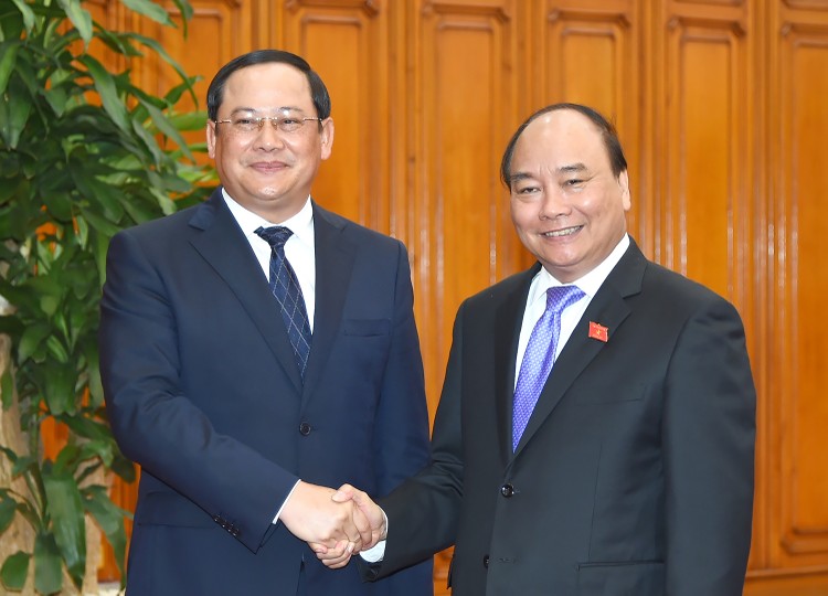 Thủ tướng Nguyễn Xuân Phúc tiếp Phó Thủ tướng Lào Sonexay Siphandone. Ảnh: VGP