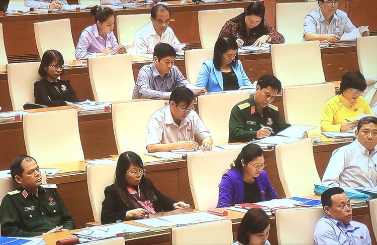 Quốc hội nghe các báo cáo về dự thảo Nghị quyết về thí điểm cơ chế, chính sách đặc thù phát triển TPHCM. Ảnh: VGP