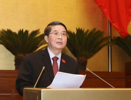 Chủ nhiệm Uỷ ban Tài chính, Ngân sách của Quốc hội Nguyễn Đức Hải trình bày Báo cáo giải trình, tiếp thu, chỉnh lý dự án Luật Quản lý nợ công (sửa đổi). Ảnh: TTXVN