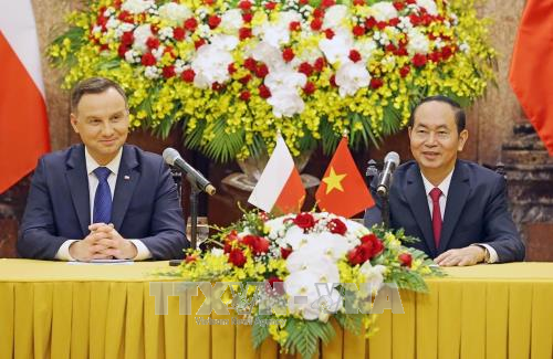 Chủ tịch nước Trần Đại Quang và Tổng thống Ba Lan Andrzej Duda chủ trì họp báo chung. Ảnh: TTXVN