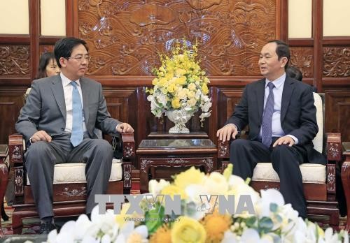 Chủ tịch nước Trần Đại Quang và Đại sứ Trung Quốc Hồng Tiểu Dũng trong buổi tiếp. Ảnh: TTXVN