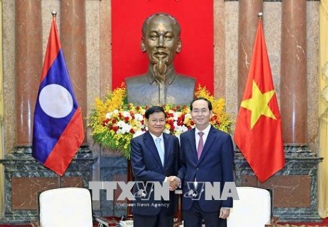 Chủ tịch nước Trần Đại Quang tiếp Thủ tướng Lào Thongloun Sisoulith - Ảnh: TTXVN
