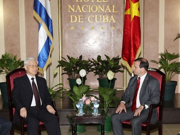 Tổng Bí thư Nguyễn Phú Trọng tiếp Chủ tịch Viện Cuba hữu nghị với các dân tộc Fernando Gonzales. Ảnh: TTXVN