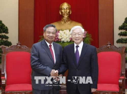 Tổng Bí thư Nguyễn Phú Trọng tiếp đồng chí  Chanxi Phoxikham, Trưởng Ban Tổ chức Trung ương Đảng Nhân dân Cách mạng Lào.