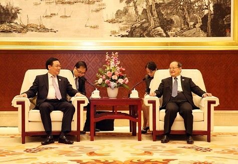 Phó Thủ tướng Vương Đình Huệ tiếp Bí thư Đảng ủy Khu tự trị dân tộc Choang Quảng Tây Lộc Tâm Xã - Ảnh: VGP