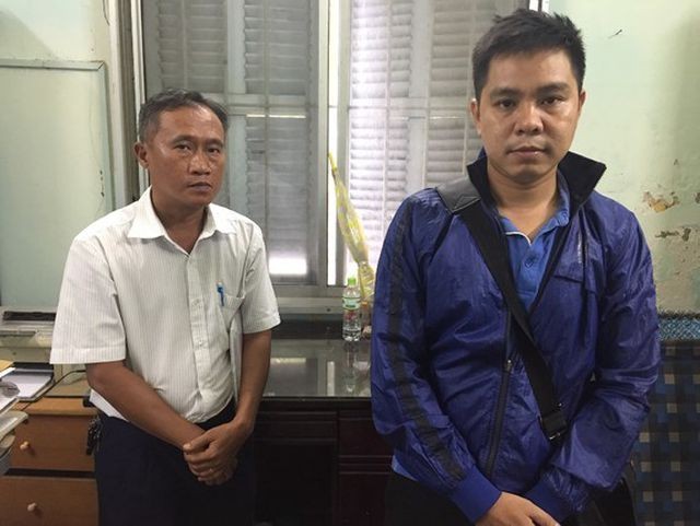 Mai Phước Việt (trái) và Lê Bảo Thành tại cơ quan điều tra.