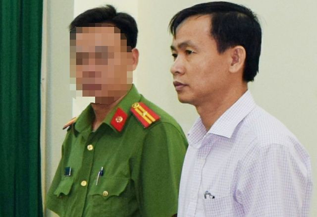 Trần Văn Tâm, nguyên giám đốc Công ty lương thực Trà Vinh khi bị khởi tố, bắt tạm giam