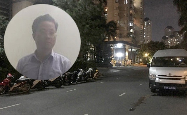 Ông Tùng (ảnh nhỏ) và xe biển xanh của Công an quận 1 tại chung cư Saigon Pearl tối 1/10.