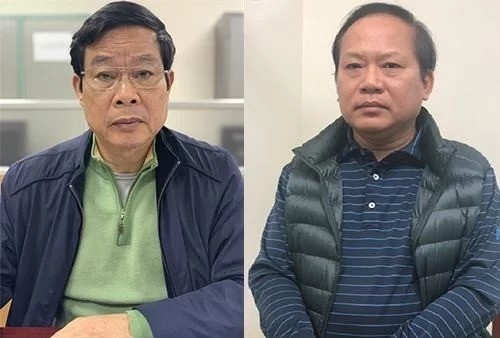 Ông Nguyễn Bắc Son (trái) và ông Trương Minh Tuấn tại cơ quan điều tra khi bị bắt vào tháng 2. Ảnh: Bộ Công an