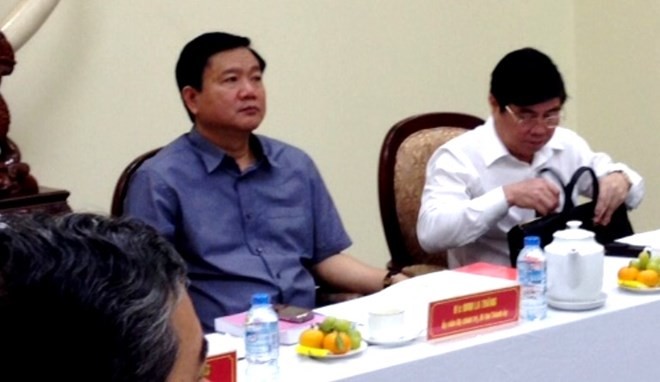 Bí thư Thành ủy TP.HCM Đinh La Thăng và Chủ tịch UBND TP.HCM Nguyễn Thành Phong trong cuộc họp với lực lượng Công an TP.HCM.