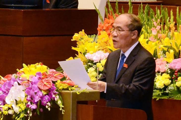Chủ tịch Quốc hội Nguyễn Sinh Hùng trình bày báo cáo về Công tác nhiệm kỳ Khóa XIII của Quốc hội sáng 22/3 (Ảnh: Đức Thanh)