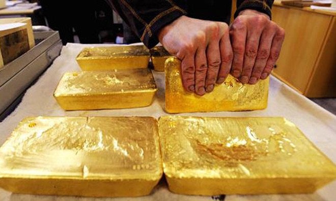 Nhu cầu vàng vật chất đang đi xuống. Ảnh: AFP.