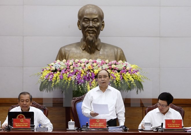 Thủ tướng Nguyễn Xuân Phúc chủ trì phiên họp Chính phủ thường kỳ tháng Tư. (Ảnh: Thống Nhất/TTXVN)