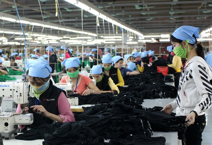 Tỷ lệ nội địa hóa của dệt may Việt Nam còn rất thấp, chỉ mới tự đáp ứng được khoảng 2% nhu cầu bông, 12,5% nhu cầu vải. Ảnh: Tất Tiên