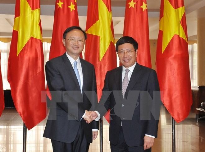 Phó Thủ tướng, Bộ trưởng Ngoại giao Phạm Bình Minh tiếp Ủy viên Quốc vụ Quốc Vụ viện Trung Quốc Dương Khiết Trì. (Ảnh: Nguyễn Khang/TTXVN)