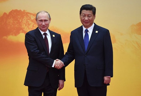 Tổng thống Nga Vladimir Putin gặp Chủ tịch Trung Quốc Tập Cận Bình tại Bắc Kinh hồi năm 2014. Ảnh: AFP