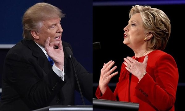 Ông Trump và bà Clinton trong lần tranh luận trực tiếp đầu tiên. Ảnh: Telegraph.