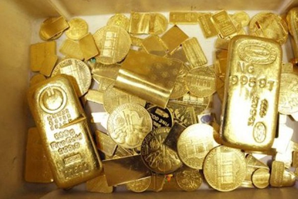 Giá vàng đang được hỗ trợ bởi nhiều thông tin tích cực. Ảnh: AFP