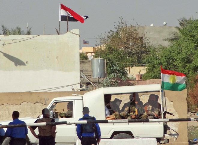 Lực lượng an ninh Iraq triển khai tại Kirkuk ngày 21/10 sau khi các tay súng IS tiến hành nhiều vụ tấn công liều chết tại thành phố này. (Nguồn: AFP/TTXVN)