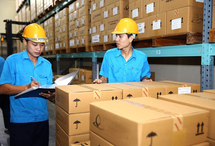 Xếp hạng môi trường kinh doanh của Việt Nam tăng 9 bậc là kết quả từ những nỗ lực cải cách của Chính phủ thời gian qua. Ảnh: Lê Tiên