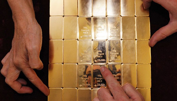 Vàng SJC vẫn cao hơn quốc tế 2,7 triệu đồng. Ảnh:AFP