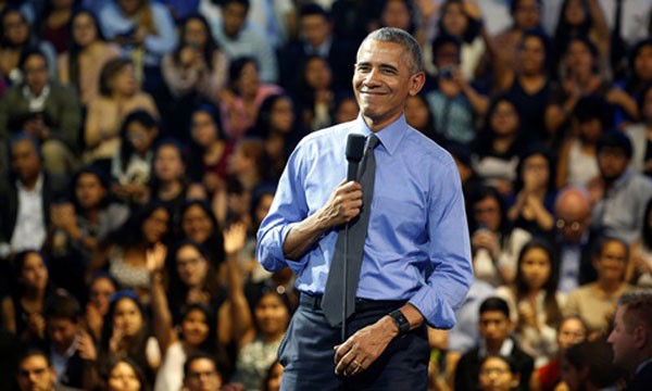 Tổng thống Mỹ Barack Obama hôm qua tươi cười trong buổi gặp mặt các nhà lãnh đạo trẻ ở Đại học Công giáo Peru, thủ đô Lima. Ảnh:Reuters