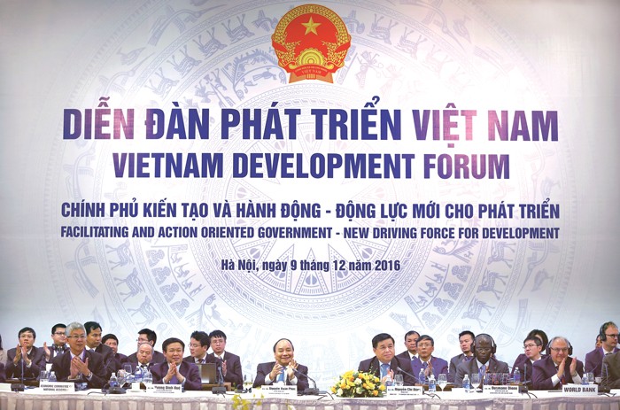 Một trong những giải pháp nâng cao an toàn nợ công được nhiều đối tác phát triển khuyến nghị tại Diễn đàn Phát triển Việt Nam là thực hiện nhanh chóng các biện pháp củng cố tài khóa. Ảnh: Lê Tiên