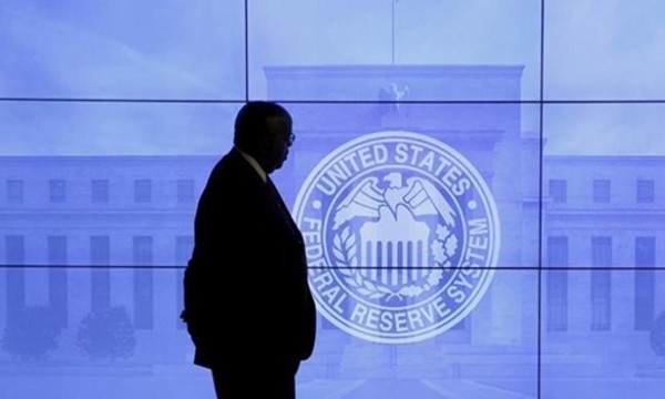 Cục Dự trữ liên bang Mỹ (Fed) vừa quyết định nâng các lãi suất ngắn hạn. Ảnh minh họa: Reuters.