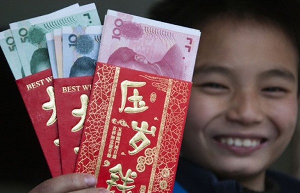 Nhu cầu tiền mặt cận Tết của người Trung Quốc đang lên rất cao. Ảnh:China Daily