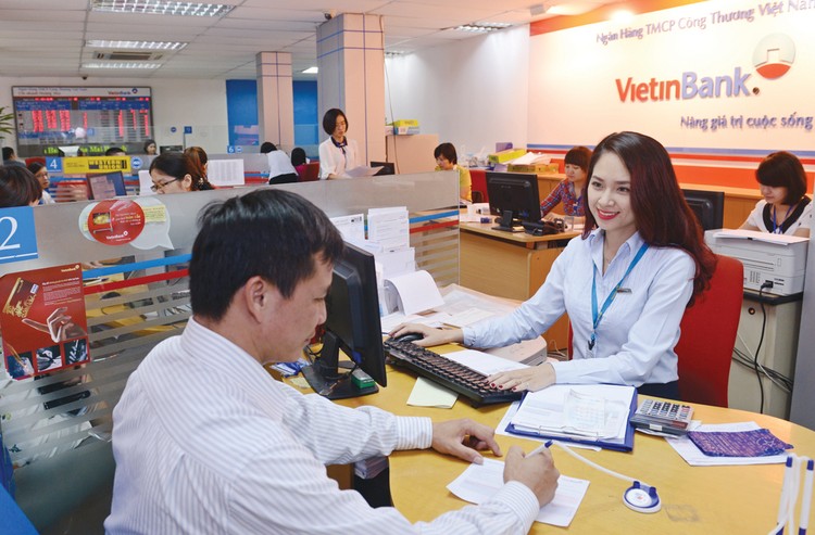 Kinh tế tăng trưởng ổn định sẽ hỗ trợ hoạt động của hệ thống ngân hàng Việt Nam. Ảnh: Tường Lâm