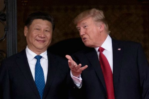 Tổng thống Mỹ Donald Trump (phải) và Chủ tịch Trung Quốc Tập Cận Bình. Ảnh:AFP