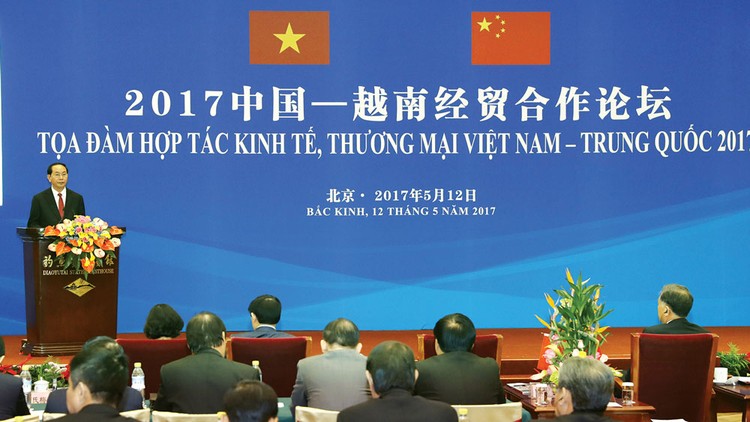 Chủ tịch nước Trần Đại Quang phát biểu tại Tọa đàm Hợp tác kinh tế, thương mại Việt Nam - Trung Quốc vừa diễn ra ở Bắc Kinh. Ảnh: TTXVN