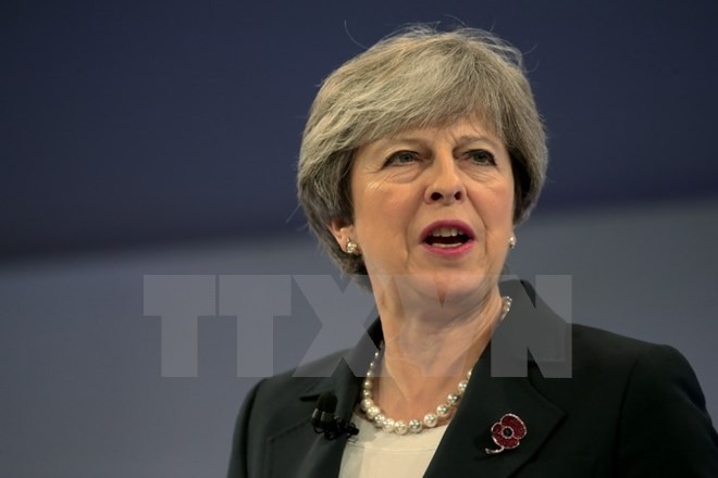 Thủ tướng Anh Theresa May phát biểu tại một hội nghị ở London ngày 6/11. (Nguồn; AFP/TTXVN)