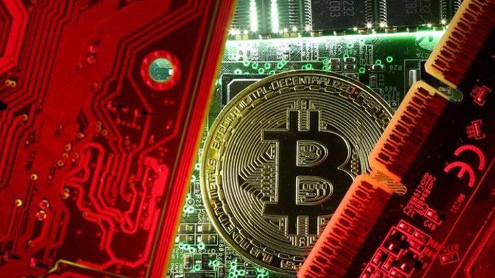 Hôm Chủ nhật, giá đồng tiền ảo lớn nhất thế giới hiện nay là Bitcoin đã lập kỷ lục mới 19.666 USD trên sàn Bitstamp có trụ sở ở Luxembourg. - Ảnh; Reuters.