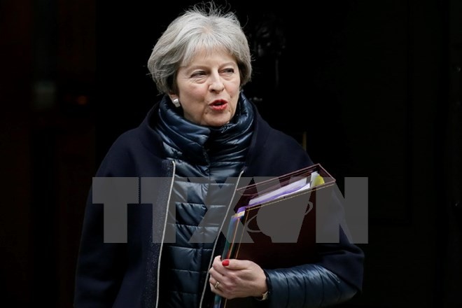 Thủ tướng Anh Theresa May tham dự cuộc họp báo tại London ngày 10/1. (Nguồn: THX/TTXVN)