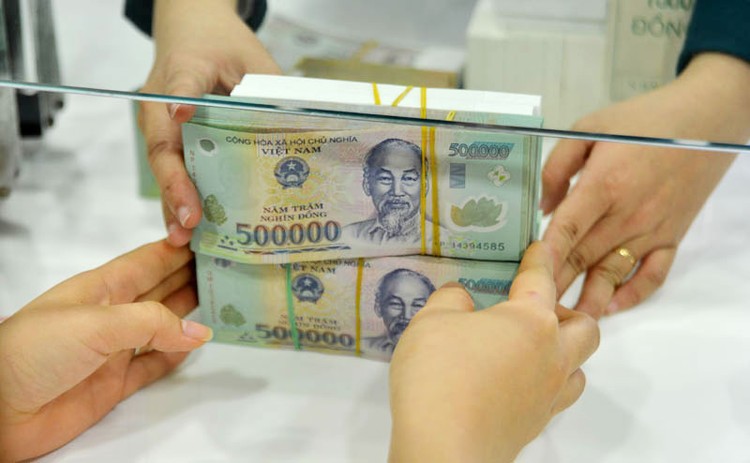 Trịnh Anh Minh huy động tiền bằng cách đưa ra mức lãi suất từ 34 - 60%/năm trong khi lãi suất ngân hàng thời điểm đó chỉ 6 - 7%/năm. Ảnh: Quang Tuấn