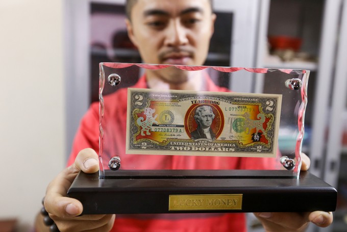 Săn tiền in hình linh vật Tết Mậu Tuất để lì xì ở Sài Gòn