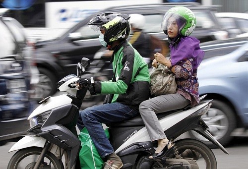 Dịch vụ xe ôm của Go - Jek tại Indonesia. Ảnh:Reuters.